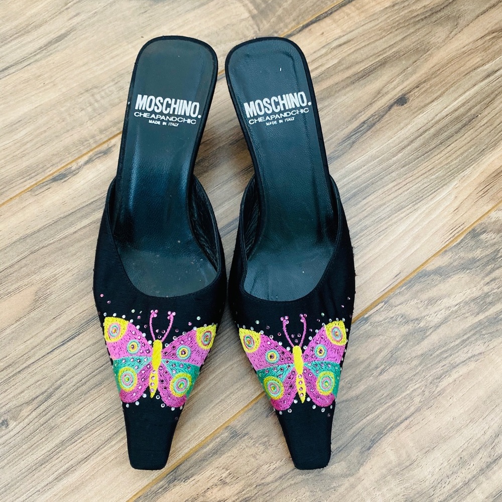 Moschino butterfly embroidered kitty heel mule.